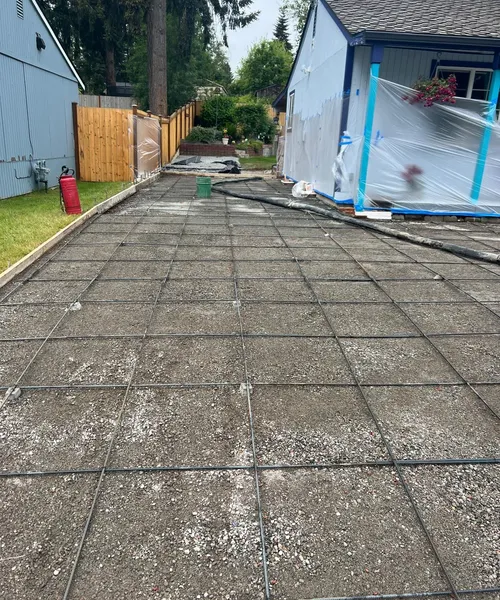 Broom finish driveway and decorate borders in Federal Way 